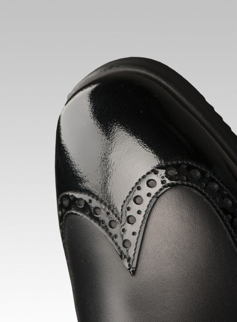 Bottes Tucci Marilyn avec détails vernis et perforés
